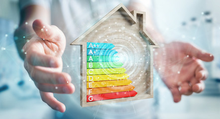 Businessman using 3D rendering energy rating chart in a wooden house