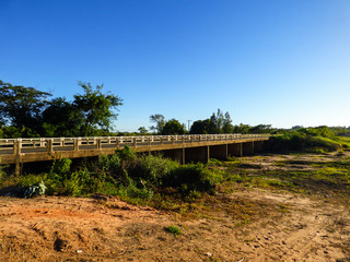 Bridge over Barragem Sanchuri (Sanchuri Dam) during dry season in Uruguaiana, Brazil