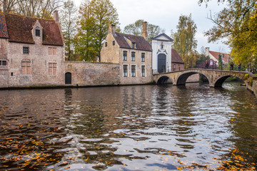 Fototapeta na wymiar Brugge medieval historic city. Brugge streets and historic center, canals and buildings. Brugge popular touristic destination of Belgium.