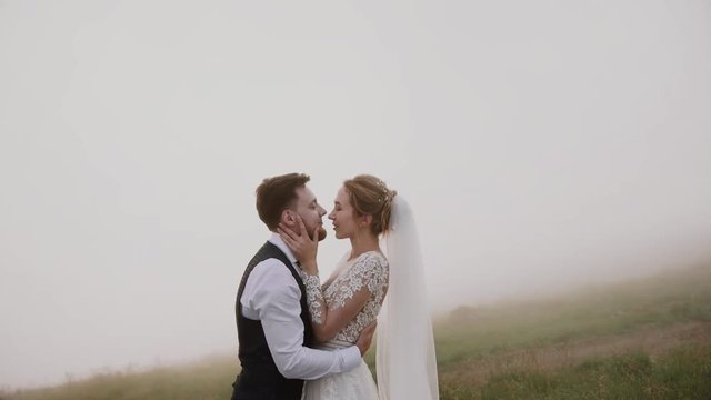 Wedding Couple Walks in Mountains 