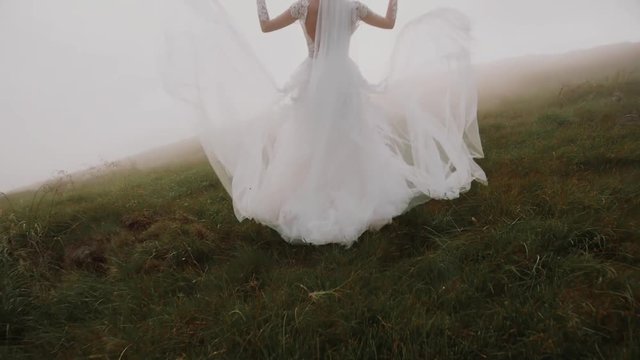 Beautiful bride on top of mountain