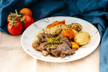 Beef meat stewed with potatoes-Traditional French cuisine Beef Bourguignon potatoes carrots in persillade