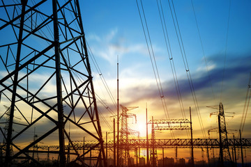 High pressure wire tower at sunset at dusk