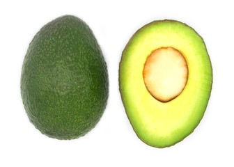 fresh organic green whole and half avocado. food and diet concept.