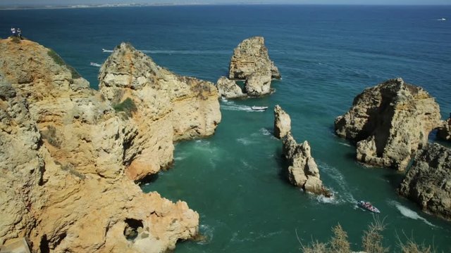 Panorama of the 182 steps long stairway to the base of cliffs of Ponta da Piedade in Lagos Bay. Famous tourist attraction in Algarve Coast in Lagos of Portugal.