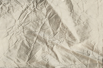 Silver gray color taffeta silk fabric closeup as textile background