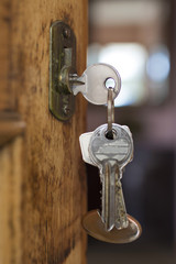 Fototapeta premium vintage door with keys in the lock