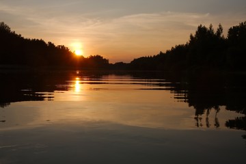 Fototapeta premium Sunset over a river