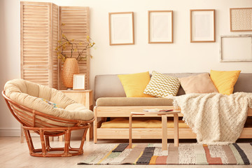 Stylish living room interior with comfortable sofa