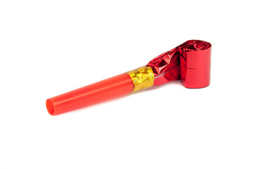 Party foil whistle on the white background