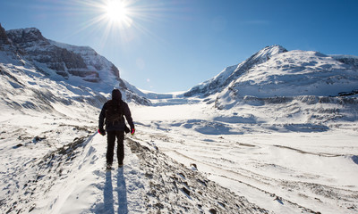 Young man hiking at Athabasca Glacier