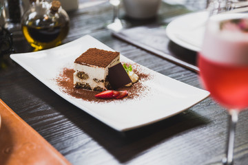 Tiramisu is a popular coffee-flavoured Italian dessert. It is made of ladyfingers dipped in coffee, layered with a whipped mixture of eggs, sugar, and mascarpone cheese, flavoured with cocoa.