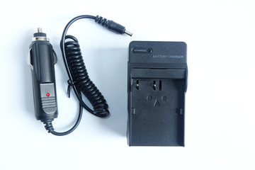 Adapter power charger battery of Camera with Car charger portable on white background.