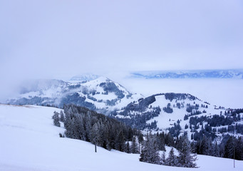 Fototapeta na wymiar Snowy mountains in the Alps of Switzerland.