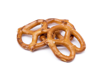 Salty cracker pretzel isolated on white background