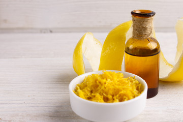 Lemon essential oil on a white background