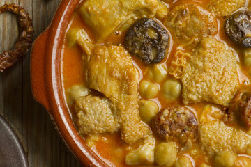 Close up of Spanish callos with chickpeas on a clay pot
