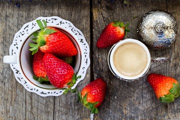 fresh organic strawberries and traditional turkish coffee on wooden background
