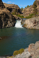 Waterfall at White River in canyon in Eastern Oregon USA Pacific Northwest.