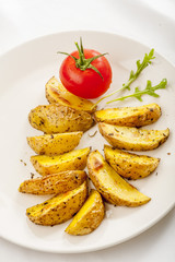 fried potatoes with tomatoes