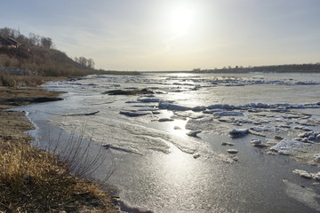 spring ice drift in the morning on the river. the season of warming