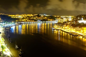 Foto op Plexiglas View of night Porto. Blurry river. Long exposure. © David Pastyka