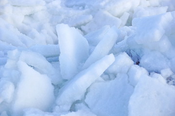 big white and blue pieces of ice and snow. debacle. ice background texture