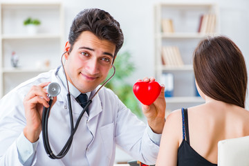 Doctor checking patient with stethoscope
