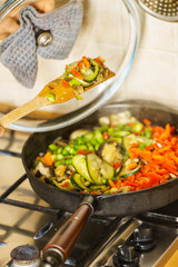 Chopped vegetables on frying pan