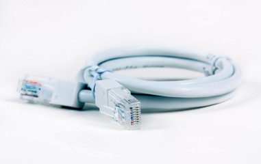 Internet cables closeup on white