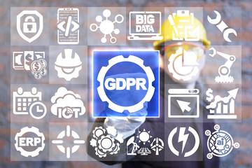 Industrial worker clicks a gdpr with gear button surrounded by specific icons. General Data Protection Security Regulation Service Industry 4.0 Smart Windows Virtual Interface Manufacturing concept.