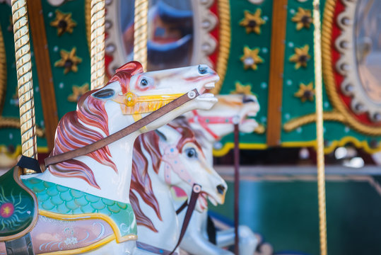 Beautiful nostalgic colorful vintage carousel merry-go-round horse ride