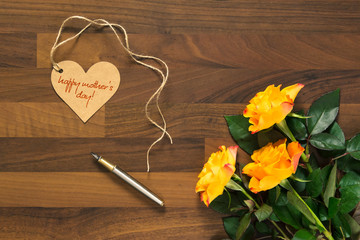 table with mothers day card with roses