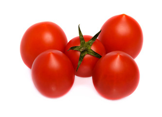 Juicy red tomato on white background, close-up. Portrait.