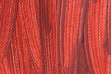 Red color of a painting on canvas