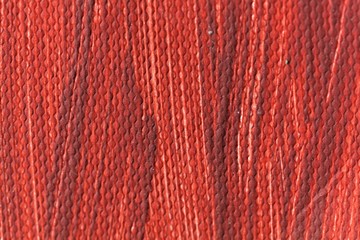 Red color of a painting on canvas