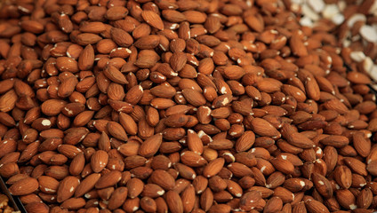 Almonds's kernel proper snack for vegan, vegetarian and people on diet. Top view.