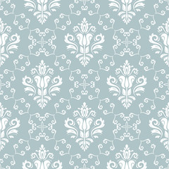 Damask classic light blue and white pattern. Seamless abstract background with repeating elements. Orient background