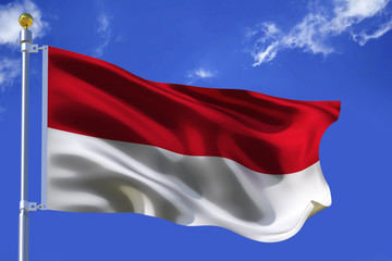 The silk waving flag of Indonesia with a flagpole on a blue sky background with clouds .3D illustration.