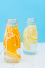 Orange and lemon detox water. Selective focus
