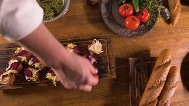 The work of a professional chef of the restaurant is a traditional Spanish dish - tapas and ingredients . The view from the top.