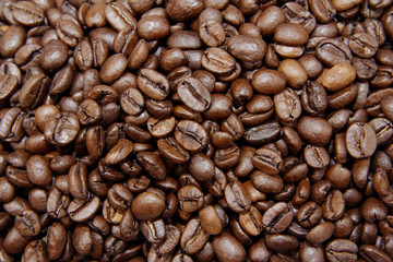 Roasted brown coffee beans close-up