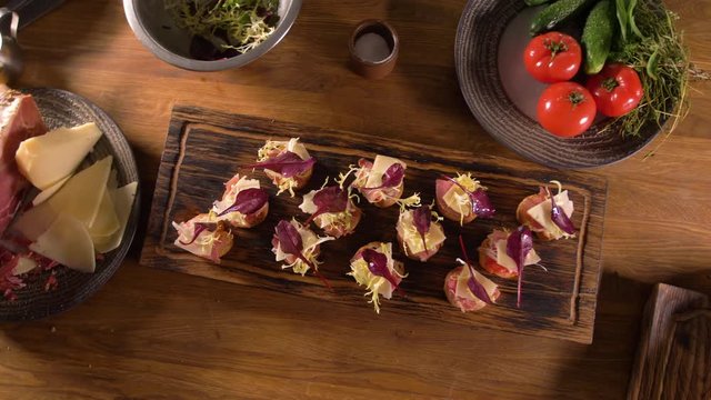 The work of a professional chef of the restaurant is a traditional Spanish dish - tapas and ingredients . The view from the top.