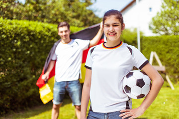 Naklejka premium Fussball Wm Familie beim Public viwing