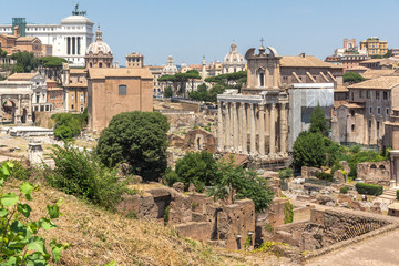 Fototapeta premium Panoramic view from Palatine Hill to ruins of Roman Forum in city of Rome, Italy