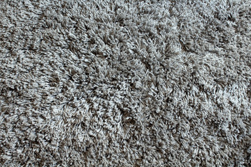 Close up view of wool, grey rug / carpet background