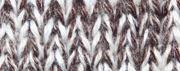 the texture of the knits on the needles close-up