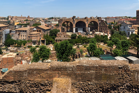 Panoramic view from Palatine Hill to ruins of Roman Forum in city of Rome, Italy