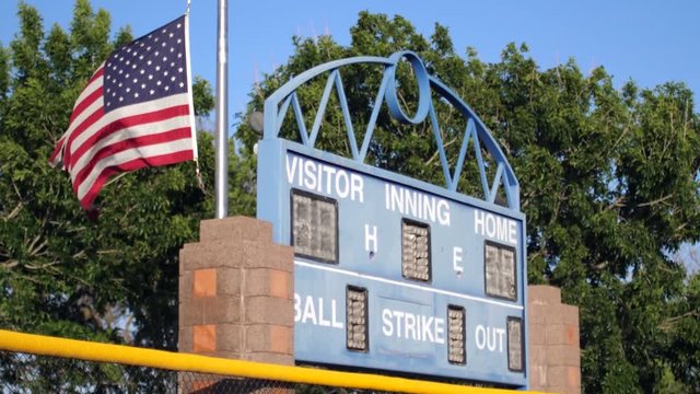 American Flag and Scoreboard Tilt Down in Phoenix, Arizona
