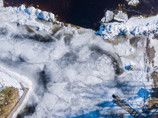Aerial view of a bay covered with ice 